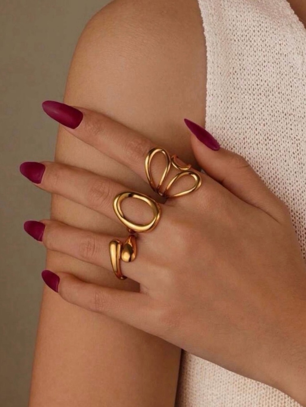 Gold Sculptural Open Ring Trio with Matte Burgundy Nails